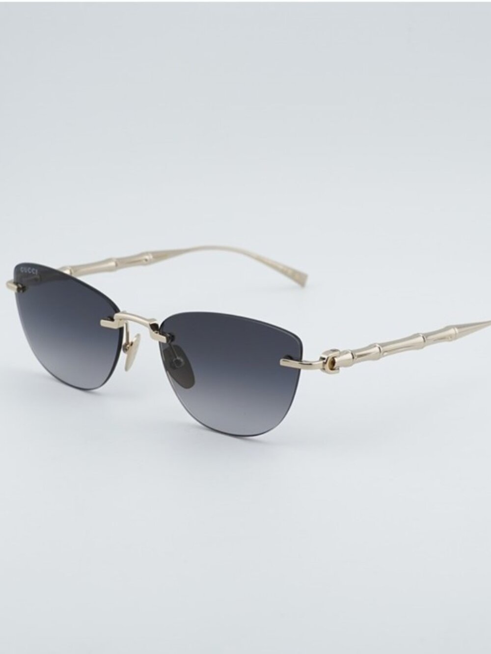 Gucci GG2063S 001 Sunglasses Endura Gold Cat Eye Frame, Grey Gradient Lenses